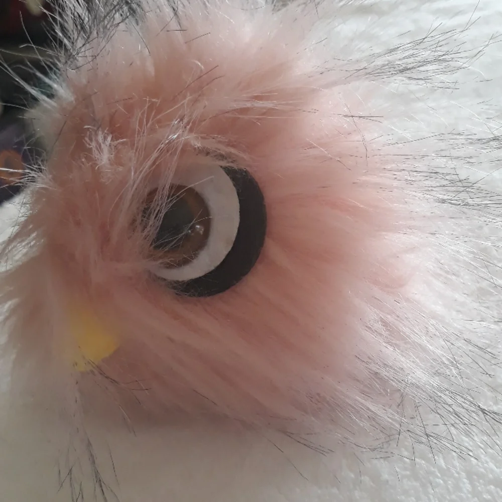 Pink fluffy bird keychain